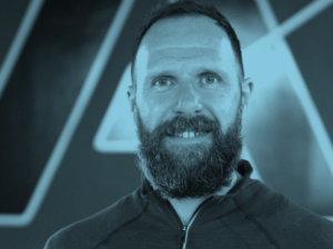 Blue-tinted headshot of Gordon Cunningham